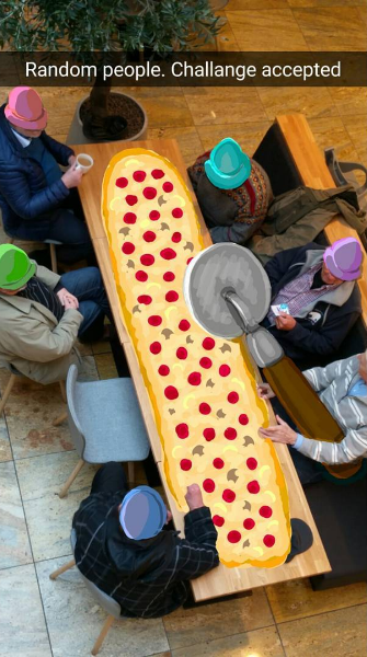 giant-pizza-snapchat.png "title =" giant-pizza-snapchat.png "width =" 335 "height =" 600 "srcset =" https://blog.hubspot.com/hs-fs/hubfs/giant- pizza-snapchat.png? t = 1539571477767 & width = 168 & height = 300 & name = giant-pizza-snapchat.png 168w, https://blog.hubspot.com/hs-fs/hubfs/giant-pizza-snapchat.png?t=1539571477767&width = 335 & height = 600 & name = giant-pizza-snapchat.png 335w, https://blog.hubspot.com/hs-fs/hubfs/giant-pizza-snapchat.png?t=1539571477767&width=503&height=900&name=giant-pizza- snapchat.png 503w, https://blog.hubspot.com/hs-fs/hubfs/giant-pizza-snapchat.png?t=1539571477767&width=670&height=1200&name=giant-pizza-snapchat.png 670w, https: // blog.hubspot.com/hs-fs/hubfs/giant-pizza-snapchat.png?t=1539571477767&width=838&height=1500&name=giant-pizza-snapchat.png 838w, https://blog.hubspot.com/hs-fs /hubfs/giant-pizza-snapchat.png?t=1539571477767&width=1005&height=1800&name=giant-pizza-snapchat.png 1005w "sizes =" (larghezza massima: 335px) 100vw, 335px