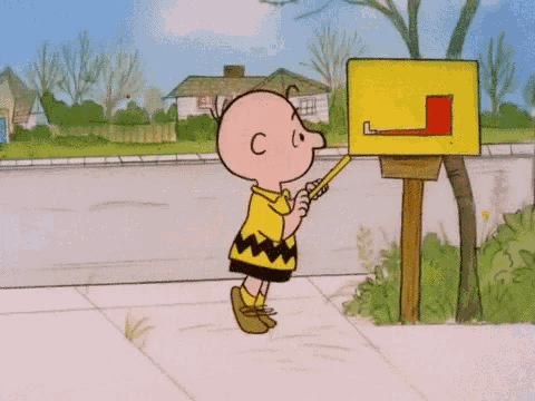 Charlie Brown guarda nella cassetta delle lettere e sospira. 